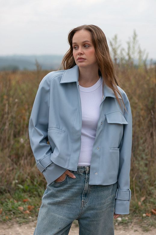 Blue short eco-leather trench coat on suede