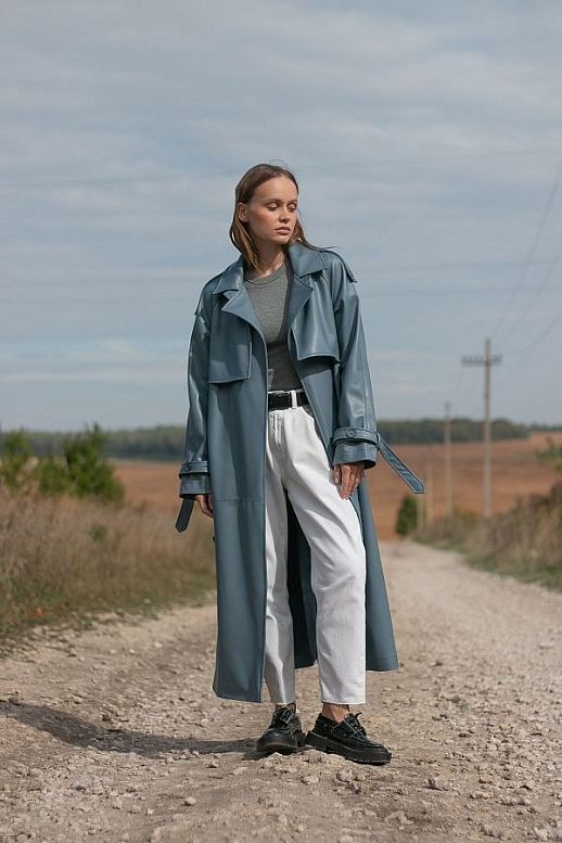 Blue eco-leather trench coat on suede